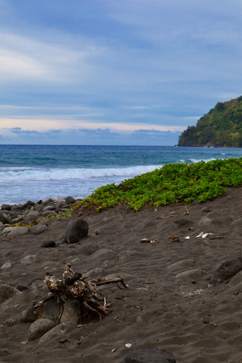 Take the twenty-three-minute stroll to 49 Black Sand Beach