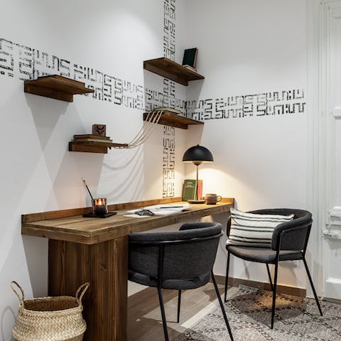 Get some work done at the home's stylish desk area