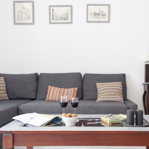 Relax on the sofa with a glass of Spanish wine