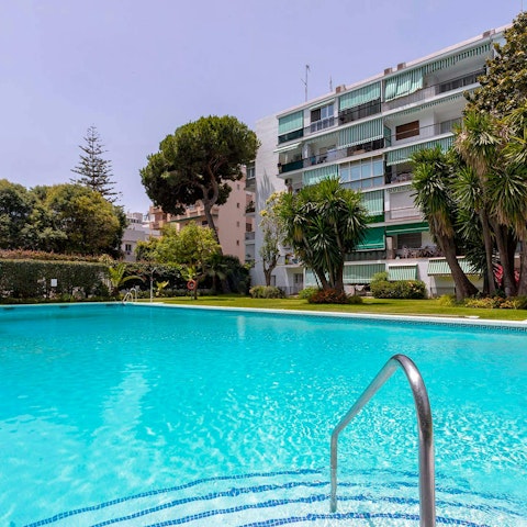 Cool off in the shared swimming pool