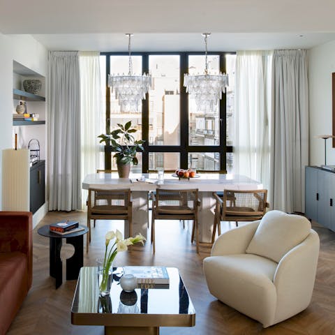Gather together for a Spanish feast at the long window-side dining table