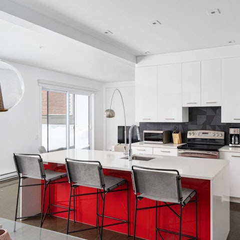 Start your day with a fresh coffee at the sleek breakfast bar