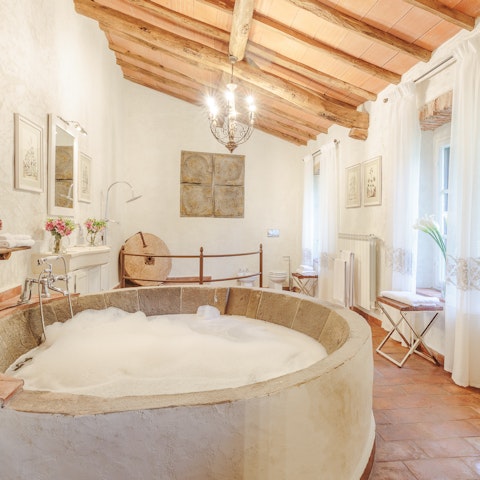 Unwind with a long soak in the millstone-inspired bath