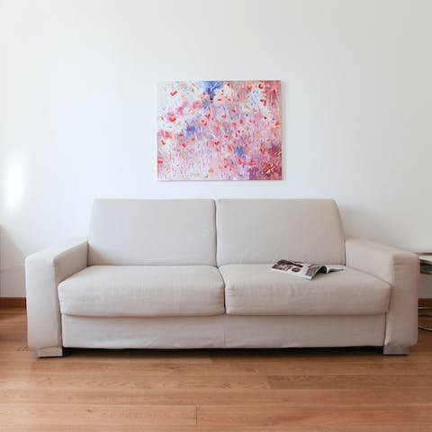 Sprawl out on the sofa for a Netflix movie night, a glass of wine in hand