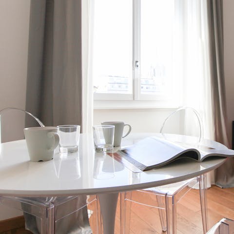 Begin the day with a light breakfast and steaming espresso around the dining table