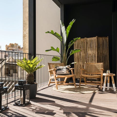 Catch some rays on the balcony's sun chairs