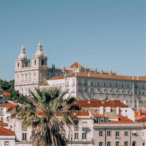 Explore Lisbon's historic Alfama district, thirty minutes away on foot