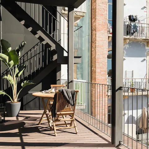 Enjoy an alfresco meal on the large private balcony