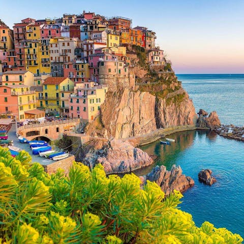 Head to the charming nearby Cinque Terre by boat or train