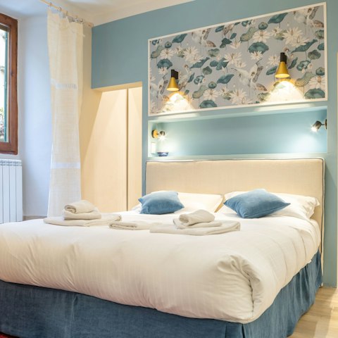 Snuggle up in the cosy bedroom after a long day exploring Florence