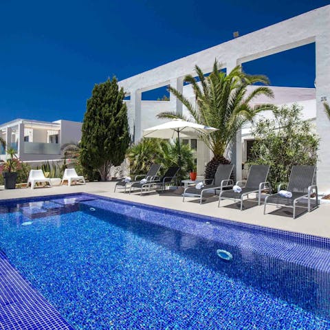 Soak up the sun next to the private pool