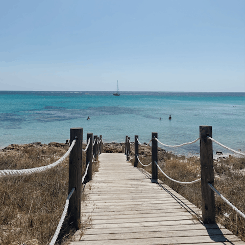 Splash into the sea at Cala Codolar – it's less than 200 metres away