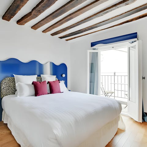 Sip your morning coffee on the petite balcony