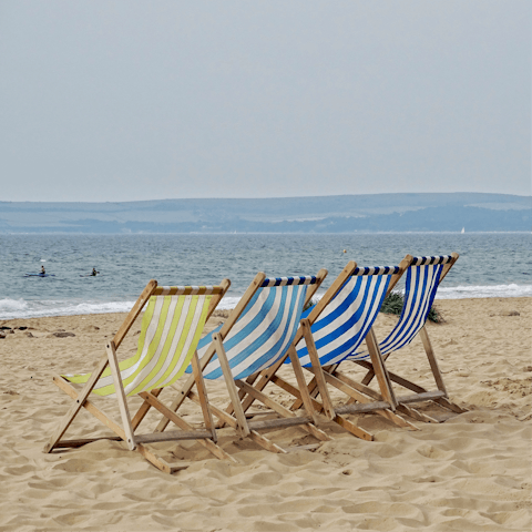 Tuck into fish and chips on the beach in Poole, just thirty minutes away
