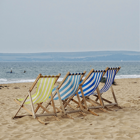 Tuck into fish and chips on the beach in Poole, just thirty minutes away