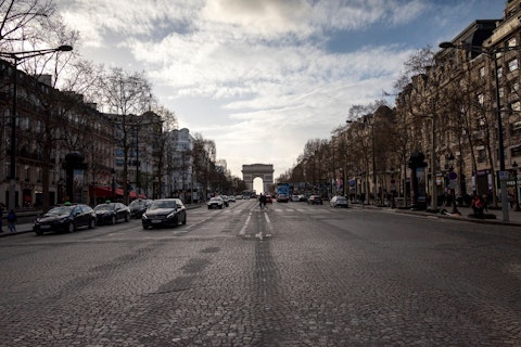 Stroll the Champs-Élysées, lined with luxury boutiques and grand cafés