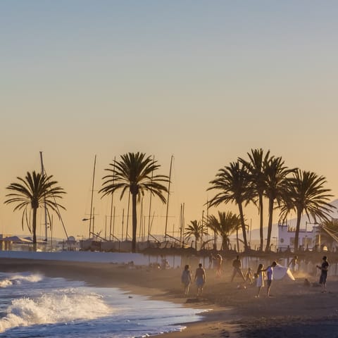 Pad barefoot to Marbella's beach, just footsteps away