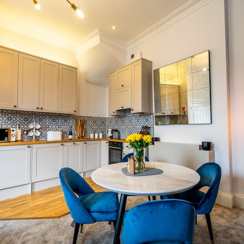 Enjoy afternoon tea and the marble kitchen table