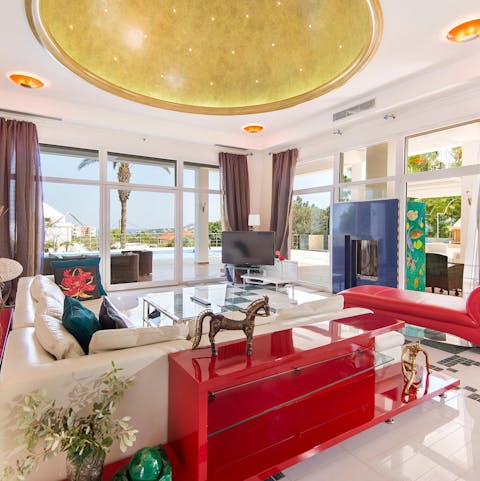 Relax in the glorious lounge with its sparkling golden dome and huge windows