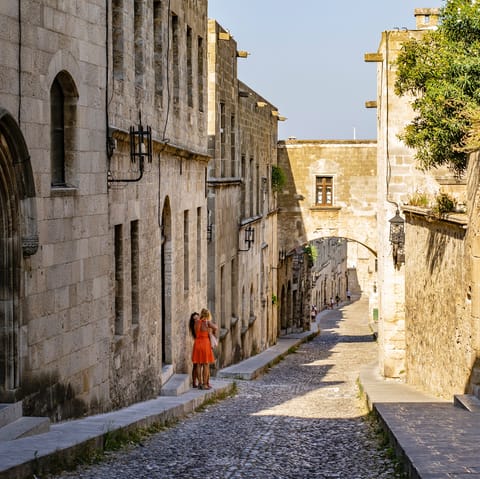 Wander the medieval streets of Rhodes Town, a ten-minute drive away