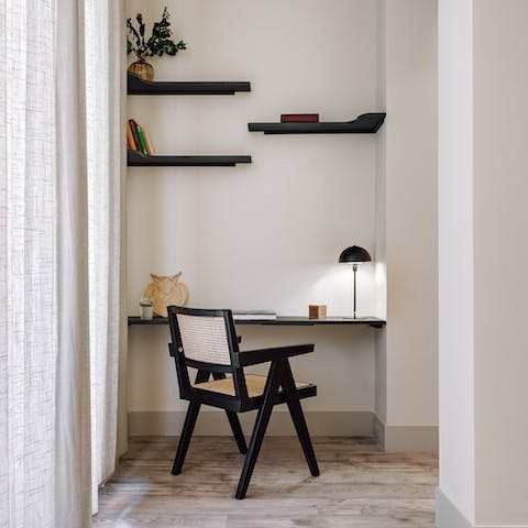 Catch up on work at the living area's cosy desk space