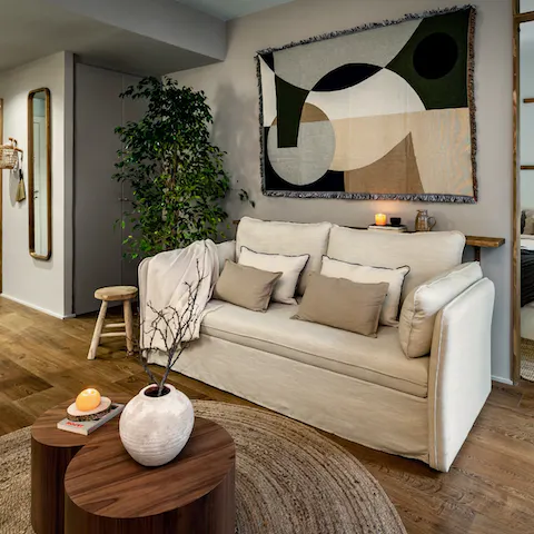 Stretch out in the living room after a day of exploring Barcelona