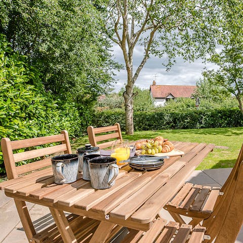 Enjoy breakfasts alfreco around the table in the bright morning sun