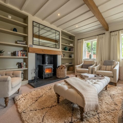 Light the fire and spend cosy afternoons reading in the sitting room