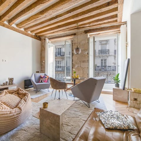 Take in the views over the street's classic Parisian architecture