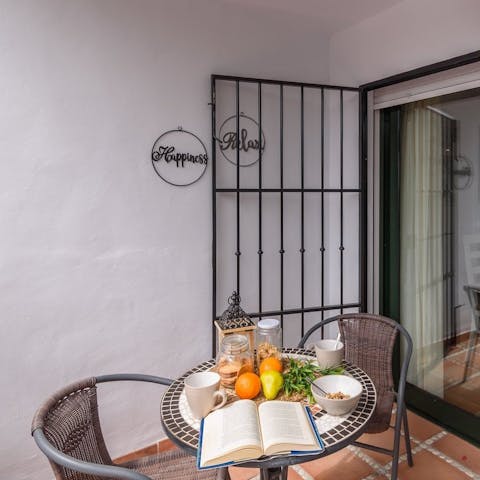 Tuck into a breakfast of fresh fruit on your private balcony
