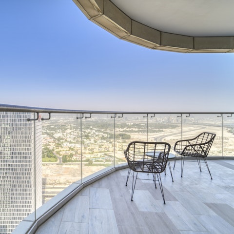 Soak up skyscraping views from the balcony, where you'll sip Arabic coffee