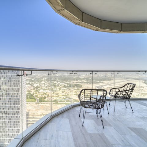 Soak up skyscraping views from the balcony, where you'll sip Arabic coffee