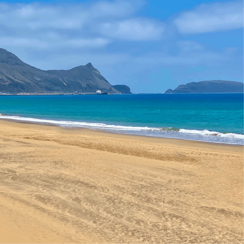 Soak up the sun from the sands of Praia da Fontinha, a short drive away