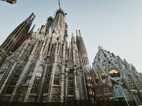 Visit Gaudí's breathtaking basilica, a sixteen-minute walk away