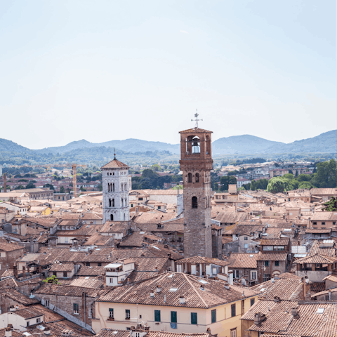 Take a thirty-minute drive to historic Lucca