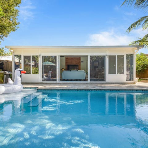 Relax and sunbathe by the private heated pool