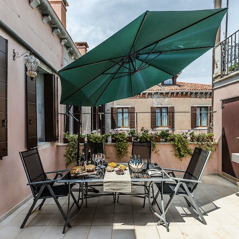 Feast on local pizza and pasta takeaways around the alfresco dining set