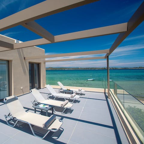 Catch some rays and admire the sea views from the balcony