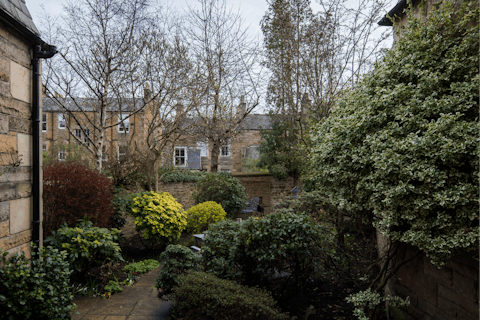 Enjoy a quiet moment in the landscaped back garden
