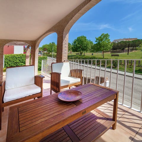 Cradle your cup of morning coffee on the terrace