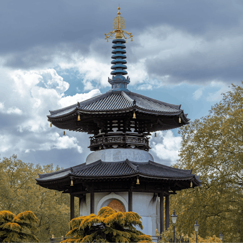 Cross Albert Bridge to stroll around beautiful Battersea Park