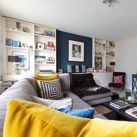 Relax amid music memorabilia in this chic apartment