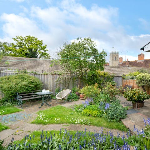 Sip your morning tea in the quaint cottage garden