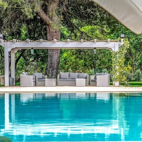 Savour the serenity of the picturesque pool and gardens