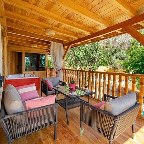 Start the day with a soak in the Jacuzzi and a cup of coffee on the balcony