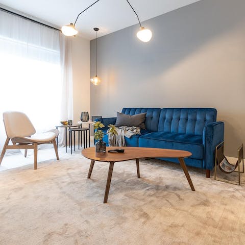 Pour a cold drink and relax on the velvet sofa