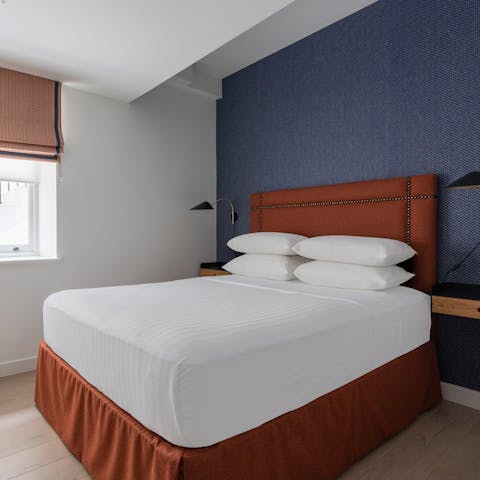 Unwind in the minimalist-style bedrooms