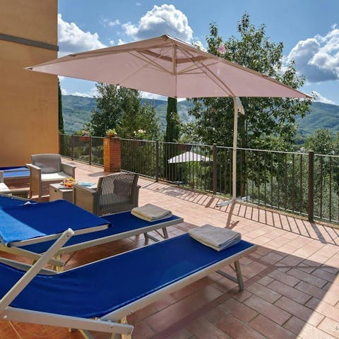 Lounge on the terrace while admiring the rolling hill landscape