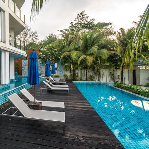 Take a refreshing dip in the communal swimming pool