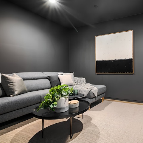 Curl up for a movie night in the home theatre